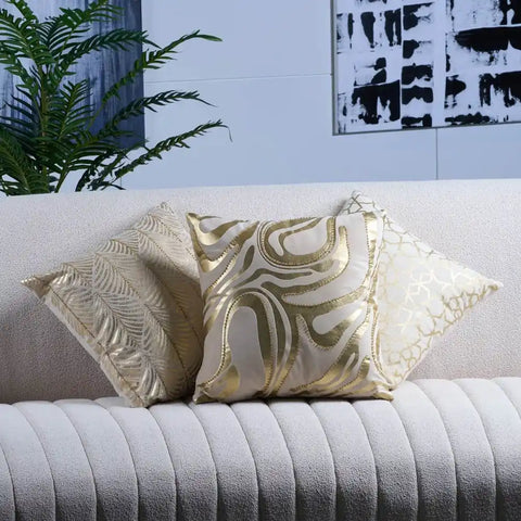 White and gold decorative throw pillow