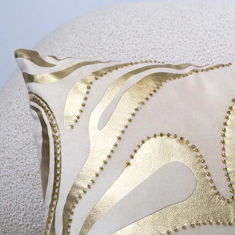 White and gold decorative throw pillow