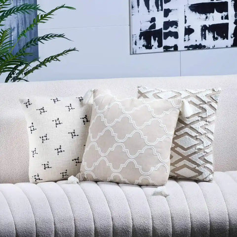Beige Throw Pillow with White Moroccan Clover Pattern and Tassels