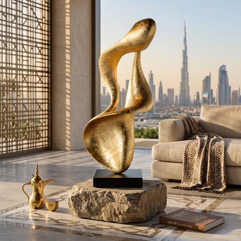 Gardeco Incontro sculpture in a gold finish