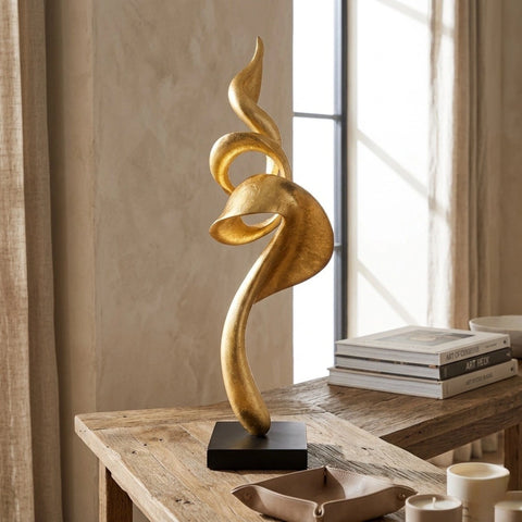 Gold-leaf finished abstract sculpture,