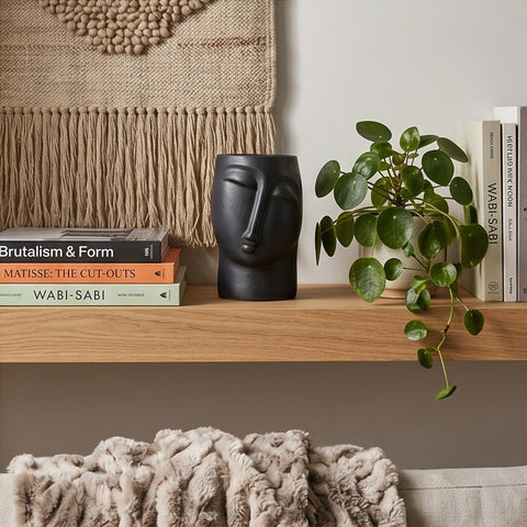 Face-Shaped Vase
